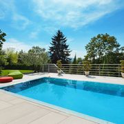 beautiful house, swimming pool nobody inside, summer day